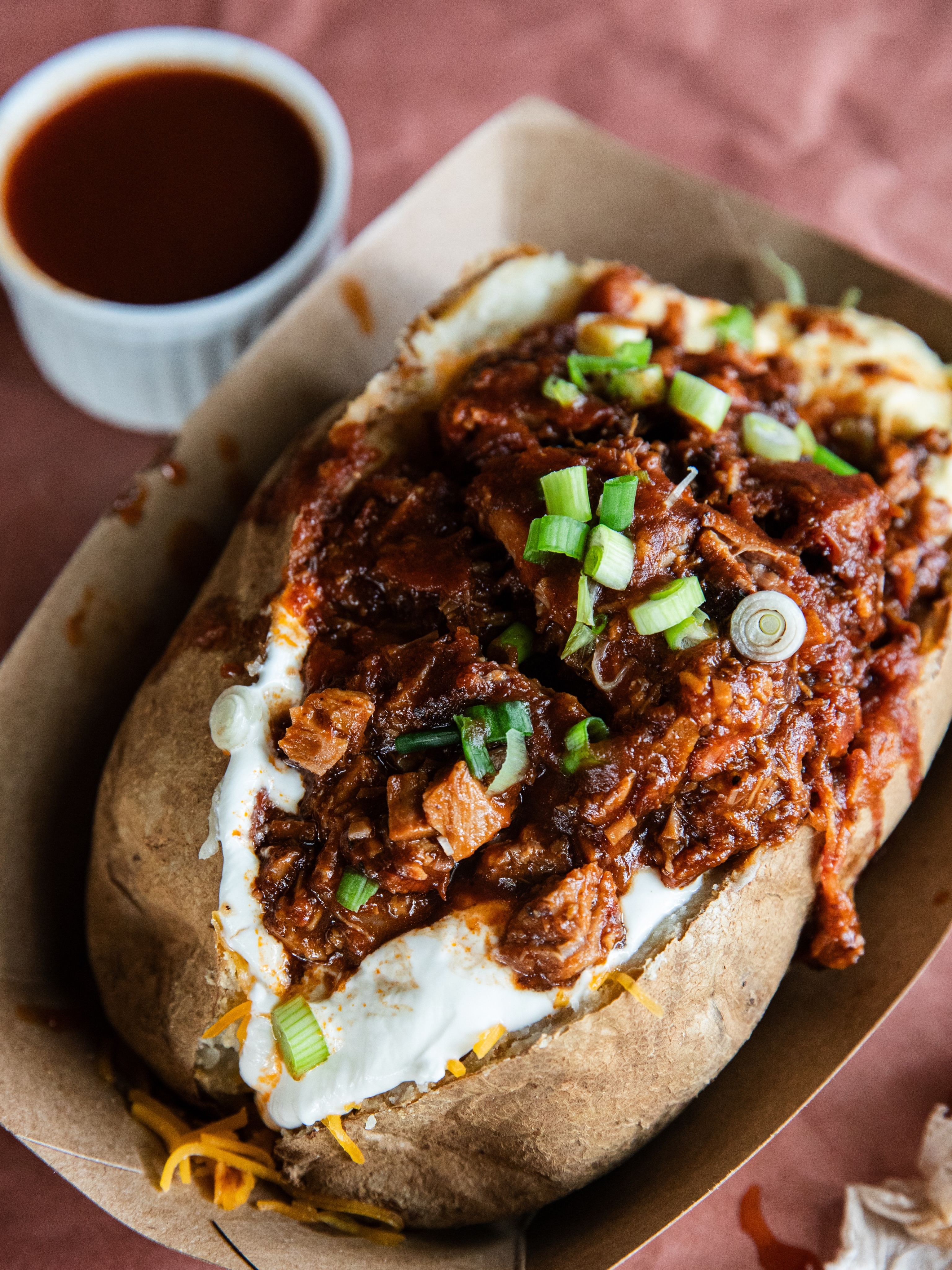 Loaded to the limit. 🔥🥔
This isn’t your average baked potato.
Butter. Melted cheese. Sour cream. Chives. A mountain of pit-smoked Texas brisket.
No questions asked.
