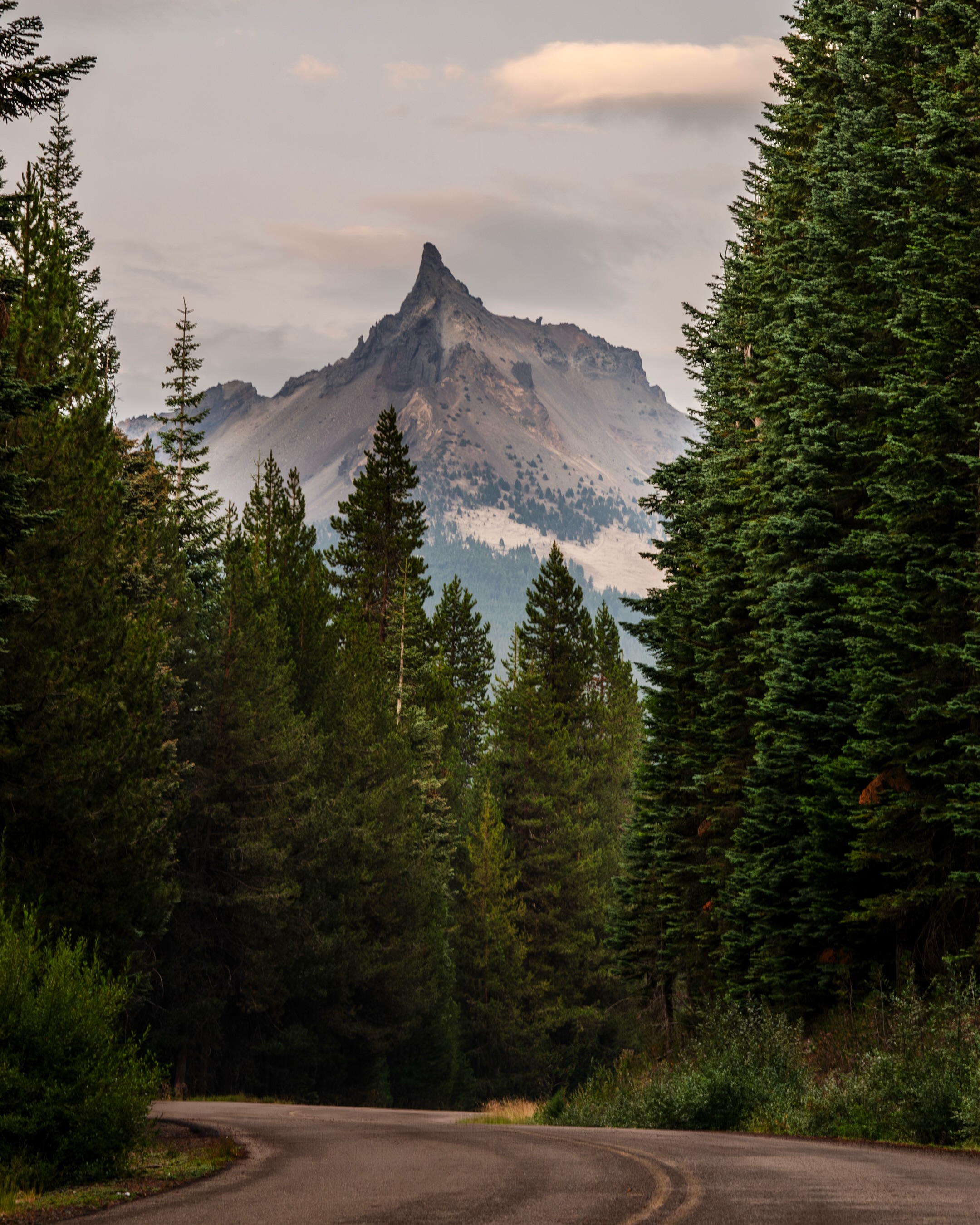 The Lightning Rod of the Cascades. ⚡️
While its official name is Mount Thielsen, its nickname couldn’t be more fitting! Rising to 9,182 feet, this jagged volcanic spire dominates the landscape north of Crater Lake and is one of the most recognizable peaks in all of Oregon. I mean, can’t you see why?! 😍
This year has been all about diving back into the archives and rediscovering forgotten gems like this one. Oregon continues to be one of my favorite states to explore because every hundred or so miles feels like stepping into an entirely different world. The diversity of its landscapes never stops amazing me.
Standing beneath this mountain, you can’t help but feel how ominous and powerful it is. It’s the kind of place that commands your attention and makes just as bold of a statement hanging on a wall 💁🏼♀️
Even the surrounding areas including the lake itself is otherworldly! I can’t wait to go back one day!