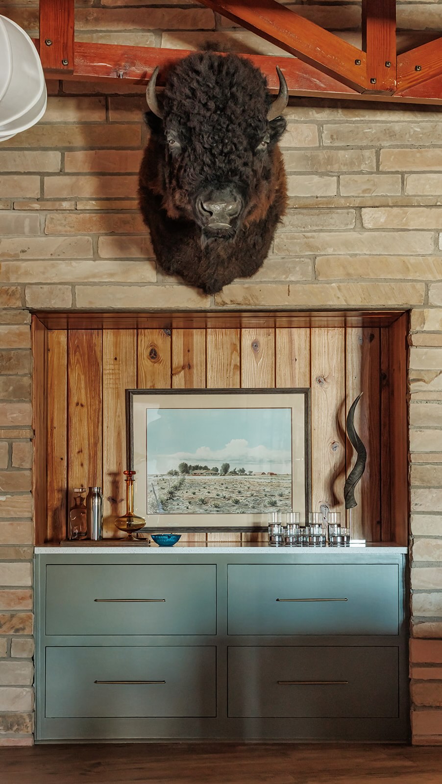 One of our favorite kinds of transformations is the one that doesn’t lose a home’s story.
We kept many of the original bones of this Retro Ranch and repurposed pieces throughout the home whenever we could. Preserving its history was one of our biggest priorities, to honor what made this home special all while creating spaces that felt functional.