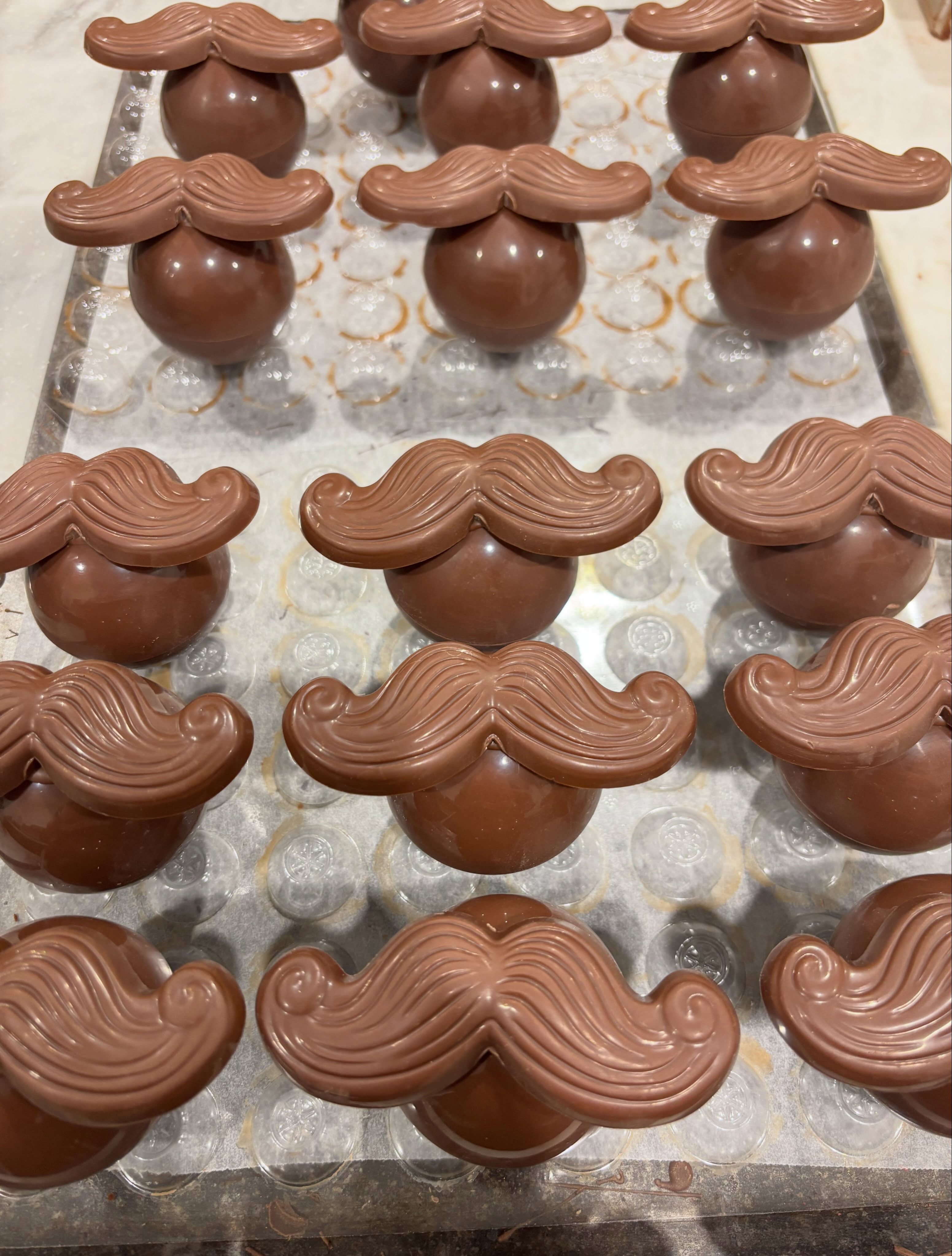 Father’s Day moustache balls making a comeback this year… first round our milk chocolate balls filled with raspberry & milk chocolate coated peanuts 🥜