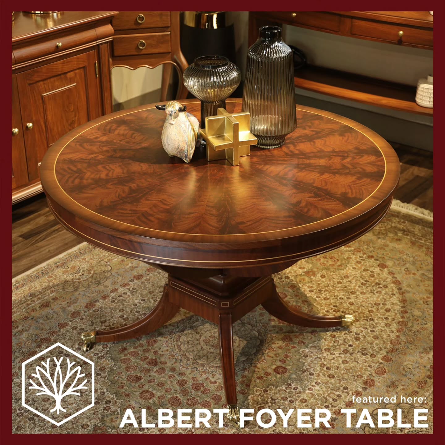 Make a striking first impression. Grounded by a robust pedestal base with delicate brass-capped feet, this centerpiece features a breathtaking mahogany crotch top with a mesmerizing plume grain pattern.