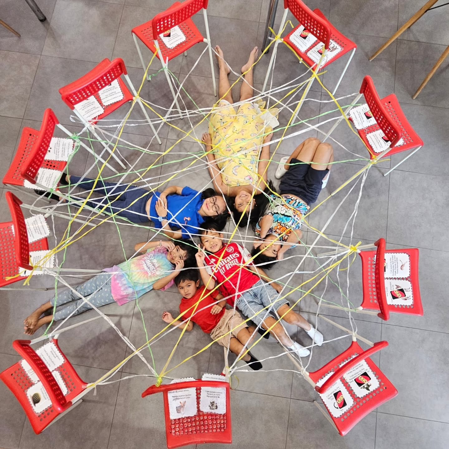 In true Reggio Emilia style, we don’t “teach” food webs by handing children a definition first. We create an active moment- a picture, a story, a mini ecosystem- and let their thinking lead. Through guided discussion (“What do you notice?” “What makes you think that?” “What else could it eat?”), children begin to realise that animals don’t just have one food source… and predators don’t just have one prey.
That’s when the magic happens: a simple food chain starts to connect, overlap, and grow. Children build, test, and revise their ideas together, turning one straight line into a living network of relationships- a food web. They’re not memorizing facts; they’re making meaning, using evidence, and learning to explain their thinking clearly.
This is how we learn at Learning Fresh: hands-on exploration, rich conversation, and visible thinking where science becomes something children can see, discuss, and truly understand.
- Melissa Liew, Mother Fox