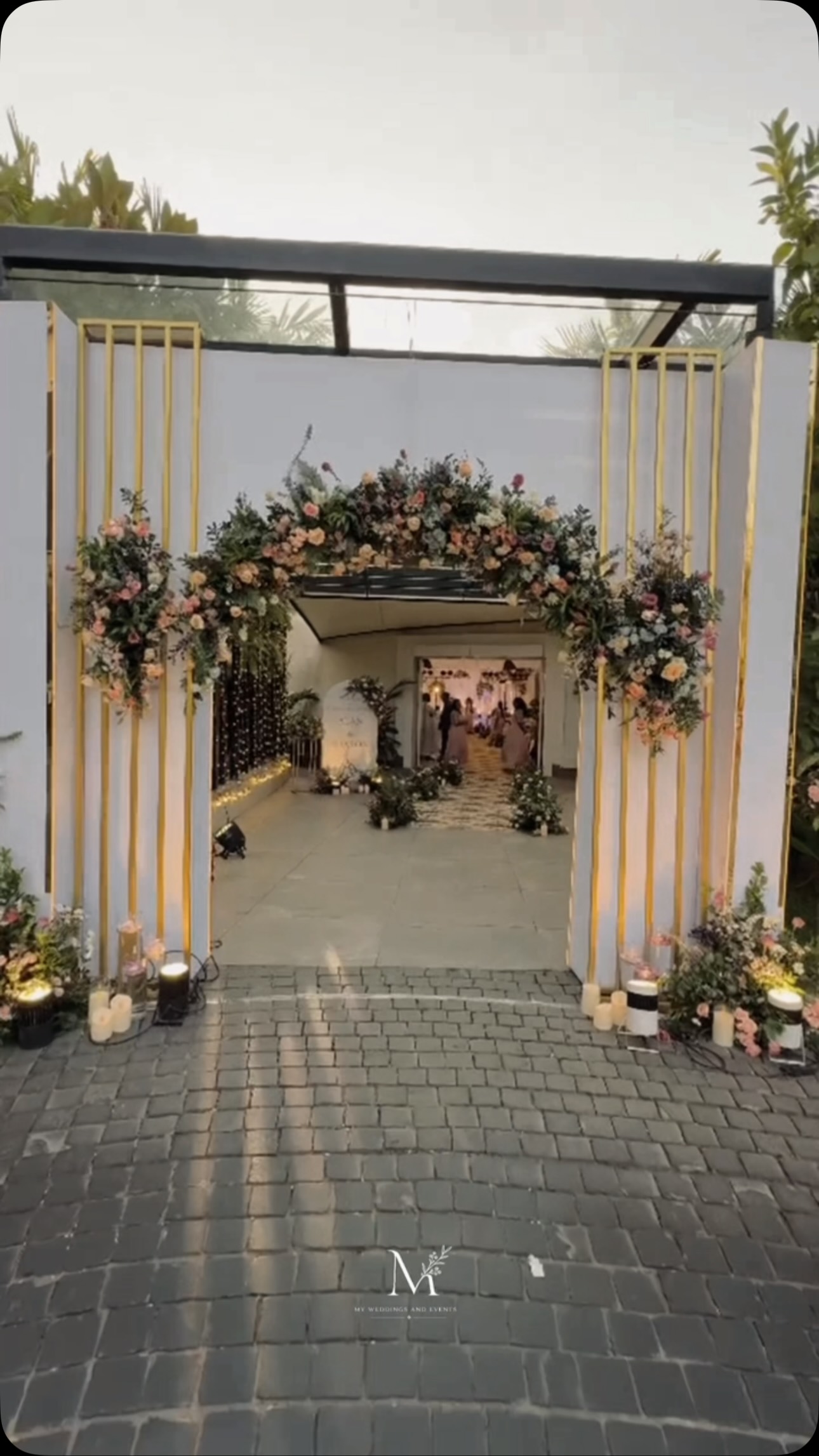 A beautiful entrance to a beautiful beginning. ✨🌸
From the delicate florals and elegant gold detailing to the warm candlelight and thoughtfully styled pathway, every element was designed to create a welcoming first impression.
A celebration of Alan & Sharon, brought to life with timeless elegance and understated luxury. 🤍
Concept • Styling • Décor • Execution
by My Weddings & Events
Wedding Decor • Luxury Wedding • Floral Styling • Wedding Entrance • Event Design
#WeddingDecor #KeralaWedding #WeddingStyling #LuxuryWedding #myweddingsandevents