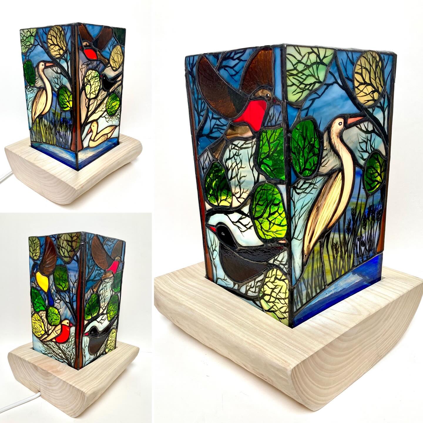 Just finished this quite spectacular Stained Glass Bird Table Lamp! It features Blackbirds, Bluetits , Bullfinch, Heron, Silver Teal Duck with hand painted woodlands and pond. The natural wood base is 23x22x7cm. The glass shade is 15x15x25cm. You can also see it on my website - www.leonastewartglass.co.uk/unique-pieces #leonastewartglass #scottishglass #stainedglass #stainedglasslamp #handmade #glasslighting #interiorstainedglass #interiorlighting #shopscotland #craftscotland #uniquelighting #handmadeinuk #handmadeinscotland