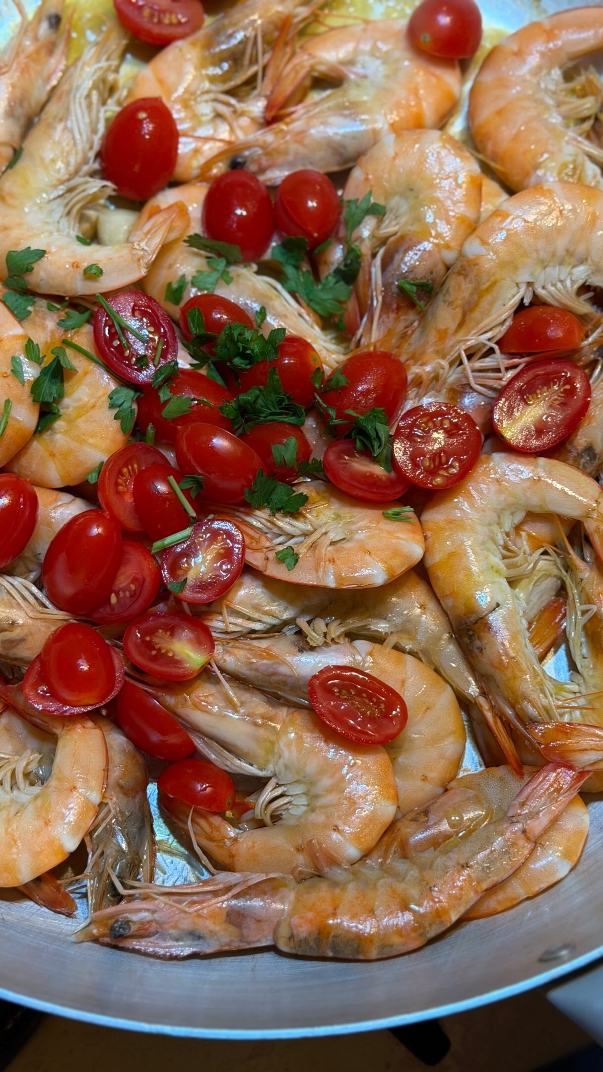 In Italy, even a trip to the fishmonger can become part of the good life. 🇮🇹
A little chat with Antonio, the freshest catch, and dinner that starts with the sea. 💙
📍Pescheria D’Abramo | Termoli, Molise —> Visit them for the freshest catch of the day in town 🐟
Save this 10-minute recipe & share it with your seafood lover friends ⬇️
“Gamberoni al vino bianco” - King Prawns in white wine 🦐
For 800g king prawns:
🧄 2 garlic cloves
🍅 200g fresh cherry tomatoes
🍷 100ml dry white wine
🌿 Fresh parsley
🫒 Extra virgin olive oil
Sauté the garlic gently in EVOO, add the prawns and cook for a couple of minutes. Pour in the white wine and let it simmer for a few minutes. Add the cherry tomatoes, give it a stir and finish with plenty of fresh parsley, season and serve with crusty bread to mop up those juices. 🇮🇹❤️
Fresh from the sea, straight to the table. ❤️
#italianfood #recipeoftheday #seaside #termoli #molise