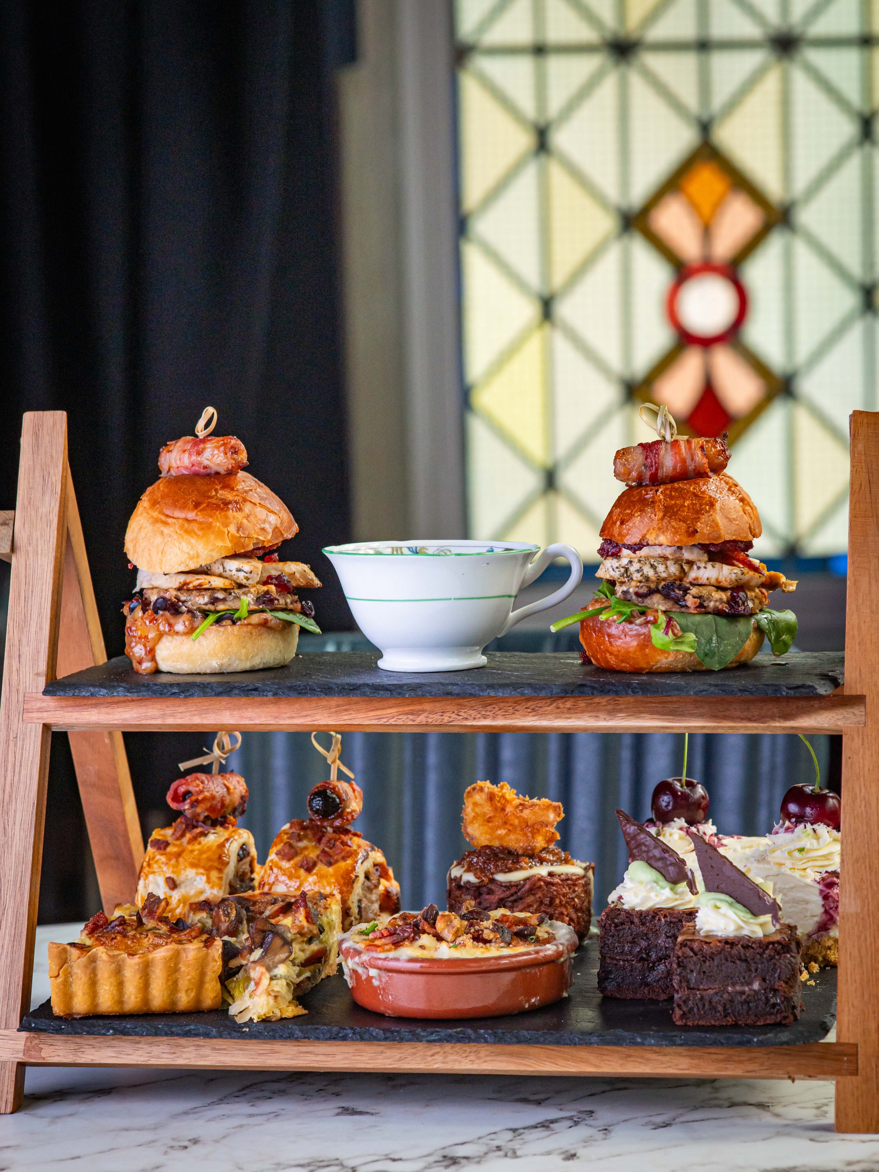 🎄✨ FESTIVE AFTERNOON TEA IS BACK! ✨🎄
It’s officially time to get festive… and we couldn’t be more excited to announce that Avonfield Festive Afternoon Tea is BACK — and this year, you can join us at BOTH of our locations! ❤️🎅🏼
From 20th November – 18th December, we’ll be serving up our very own festive feast every Monday, Wednesday, Friday & weekend, with sittings at 12pm & 2:30pm. (Weekends 2.30pm sitting only)
🎟️ £35 per person
👯♀️ Served sharing-style for two people
🕛 12pm & 2:30pm (Weekends 2.30pm only)
And just look at what’s on the festive board… 👀🎄
🥯 Fat Santa Brioche ×2
Pig-in-blanket-topped brioche with turkey, stuffing, cranberry, leaves & streaky bacon, served with a little teacup of festive gravy for dipping 🤤
🥧 Festive Sausage Roll ×2
Topped with delicious devils on horseback
🧅 Cheddar, Leek, Bacon & Chestnut Quiche ×2
🥔 Loaded Cauli Cheese Hash Brown
Our signature hash brown topped with creamy cheese sauce, smoked bacon jam and a floret of crispy panko cauliflower
🧀 Side of Cauli Cheese
Topped with panko, Parmesan and chestnut crumb
🍰 Snowball Cheesecake ×2
🍫 After Eight Brownie ×2
And of course, it wouldn’t be afternoon tea without a lovely cuppa! ☕️✨
Your afternoon tea includes your choice of tea or coffee, including anything from our festive coffee & hot chocolate menu. 🎄☕️
As always, vegetarian & gluten-free alternatives are available, and we can cater for dietary requirements — just let us know when booking. ❤️
SWIPE FOR MORE ➡️
📍 TWO FESTIVE LOCATIONS
This year, you can enjoy our Festive Afternoon Tea at either of our two locations — so why not choose the setting that suits you best? 🎄✨
🏛️ THE OLD TOWN HALL
Our Town Hall location is perfect for larger groups, with easy access and inclusive facilities. Plus, it’s fully alcohol licensed, so you can enjoy a festive tipple alongside your afternoon tea! 🥂🎄
🌲 THE NURSERY
Our original Avonfield site, offering a cosy and intimate setting with all the festive feels. Perfect for a relaxed Christmas catch-up and a little seasonal magic. ✨
🎅🏼 Whether it’s a pre-Christmas catch-up with friends, a festive family treat, a Christmas date or simply an excuse t