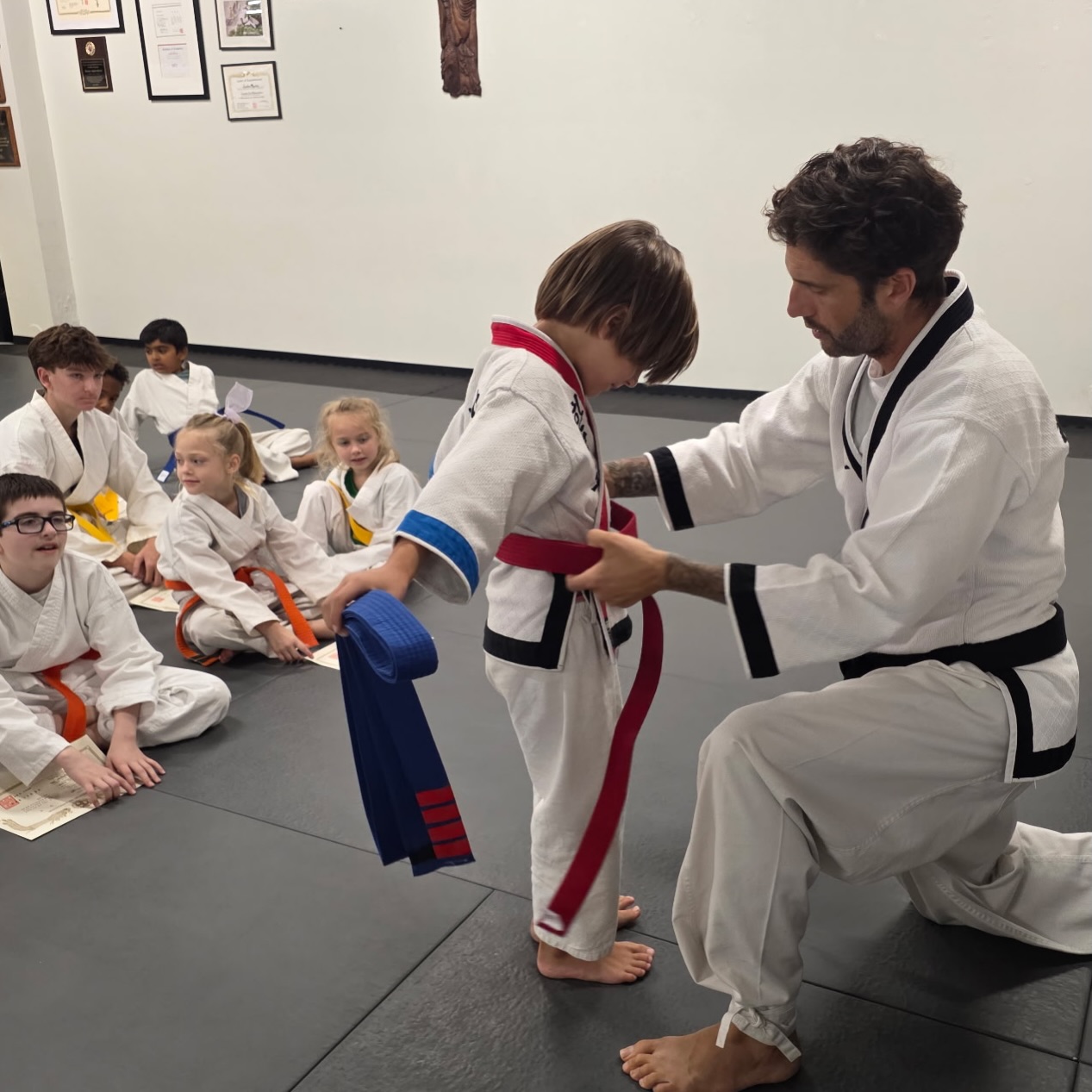 There are moments as a parent and instructor that mean a little more.
Tying my son’s red belt on after testing was one of them.
I’ve had the privilege of watching him grow up in Han Mu Do and seeing his movement and understanding grow, his confidence grow, and the excitement he still feels when his hard work leads to progress. That red belt represents another step forward, but what matters most is the person being developed along the way.
Kids who grow up practicing martial arts gain so much more than techniques and belts. They learn how to work toward something that takes time. They learn to handle challenges, accept correction, overcome frustration, respect others, and keep going when things get difficult.
They become stronger physically, mentally, and spiritually.
#Harvest #HanMuDo #dadlife #FranklinTN #kids