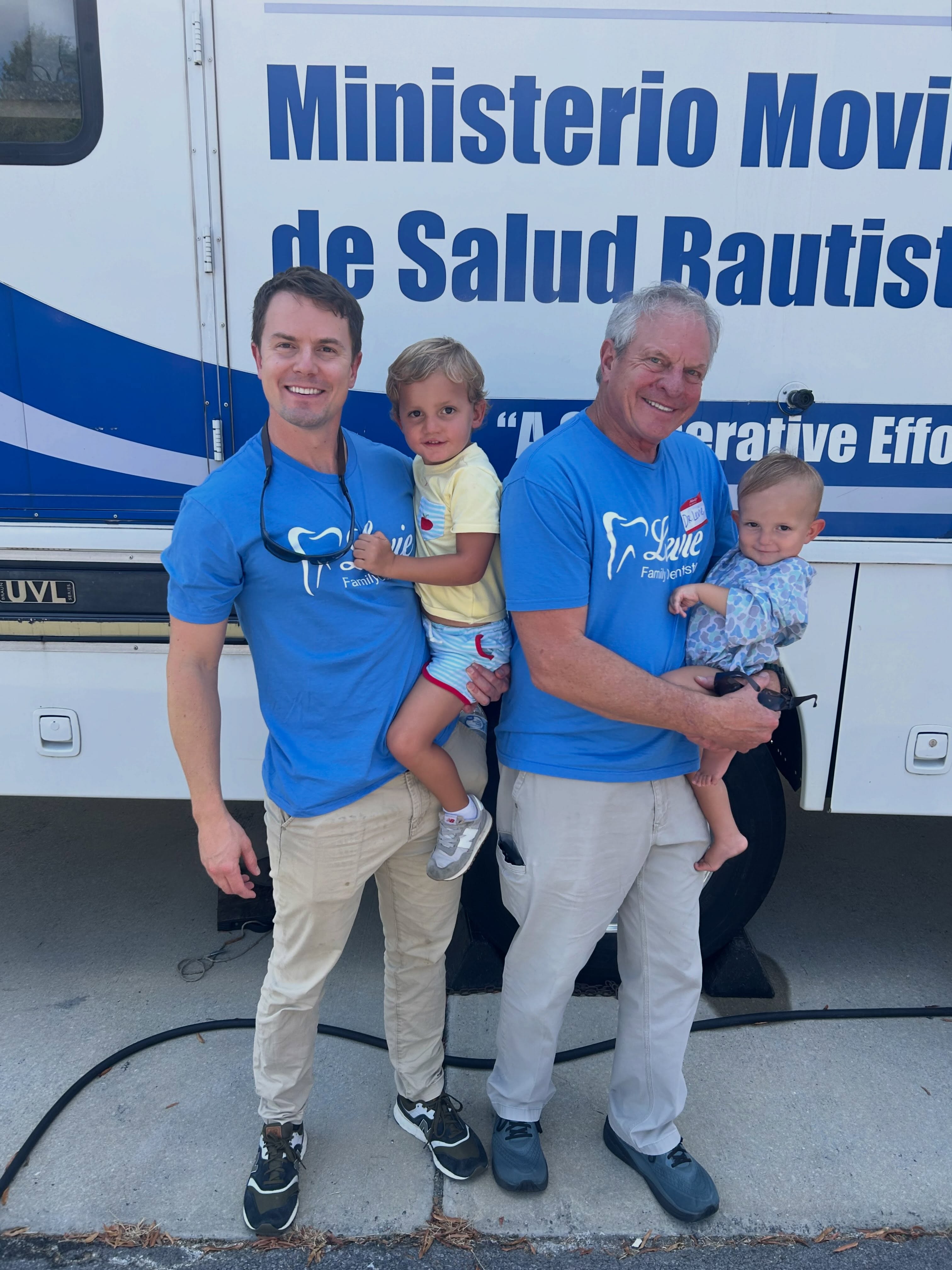 Dental Bus Day 2 🦷💙 Three generations on the job! Dr. Ty and Dr. Levie working the bus, with Tate and Tuck stopping by to supervise. We are grateful for everyone who has trusted us with their care!