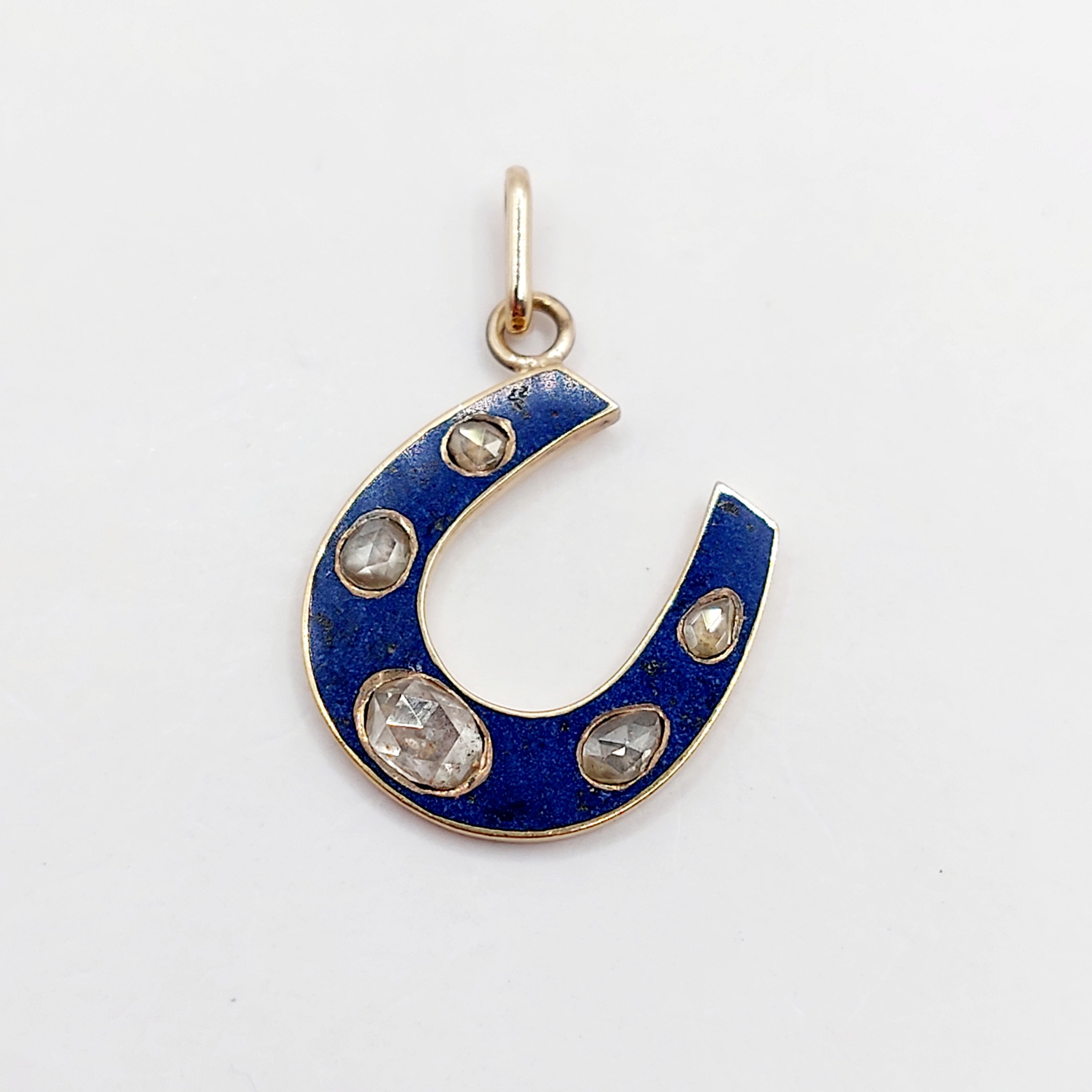 // SOLD \\French victorian horseshoe pendant 18k gold set with rose-cut diamonds and blue enamel (circa 1890)
PRICE : 850€
Magnificent late 19th-century French Victorian work (transformation of an old Victorian pin into a pendant)
Size: 26 x 17 mm (including bail)
Horseshoe alone: 17 x 16 mm
Weight: 2.65 g
Main diamond: approximately 5 x 3.5 mm
Micro scratches from use
Hallmarks worn away during the transformation
#pendentifdiamant #diamondcharm #halfmooncharm #halfmoon #omcdiamond #oldminecut #oldminecutdiamond #mooncharm #victorianjewelery #pendentiflune #starburstcharm #frenchjewellery #starcharm #starpendant #horseshoe #horseshoependant