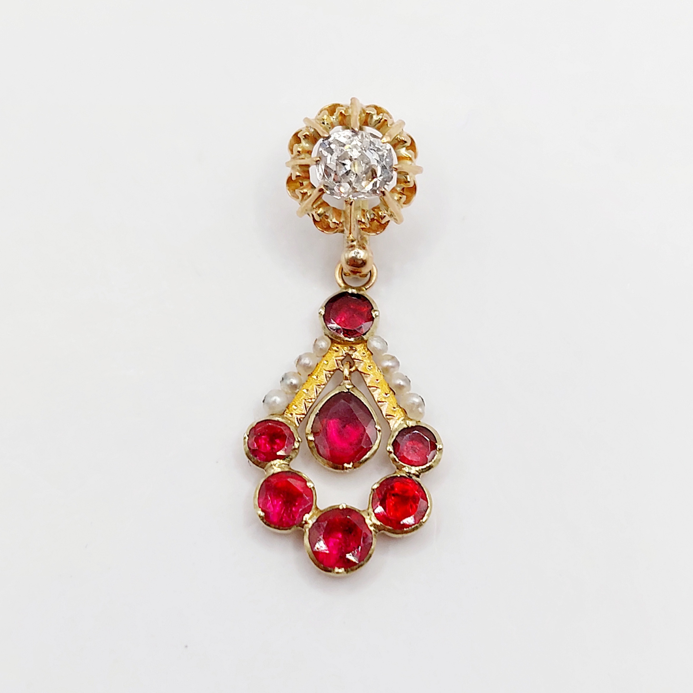 French antique pendant 18k gold set with a 0.40 carat old mine cut diamond, garnets and pearls (circa 1890)
PRICE : 850€
Magnificent antique French work (likely an old Victorian sleeper earring converted into a pendant)
Size: 31 x 12.5 mm (including bail)
Weight: 2.11 g
Diamond size: approximately 5.0 x 4.4 x 3.0 mm (estimated at 0.40 carat) Old-cut cushion cut
Small scratch next to a prong, natural inclusions present (one dark inclusion visible to the naked eye)
Micro scratches from use and slight wear to the stones
Hallmarks removed by modification
#diamond #artdeco #artdecocharm #goldcharm #goldpendant #frenchjewelry #frenchjewellery #oldminecut #oldminecutdiamond #daisycharm #oldeuropeancutdiamond #oldminecutdiamonds #garnet